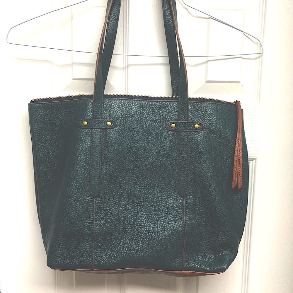 Fossil purse forest green with brown trim.